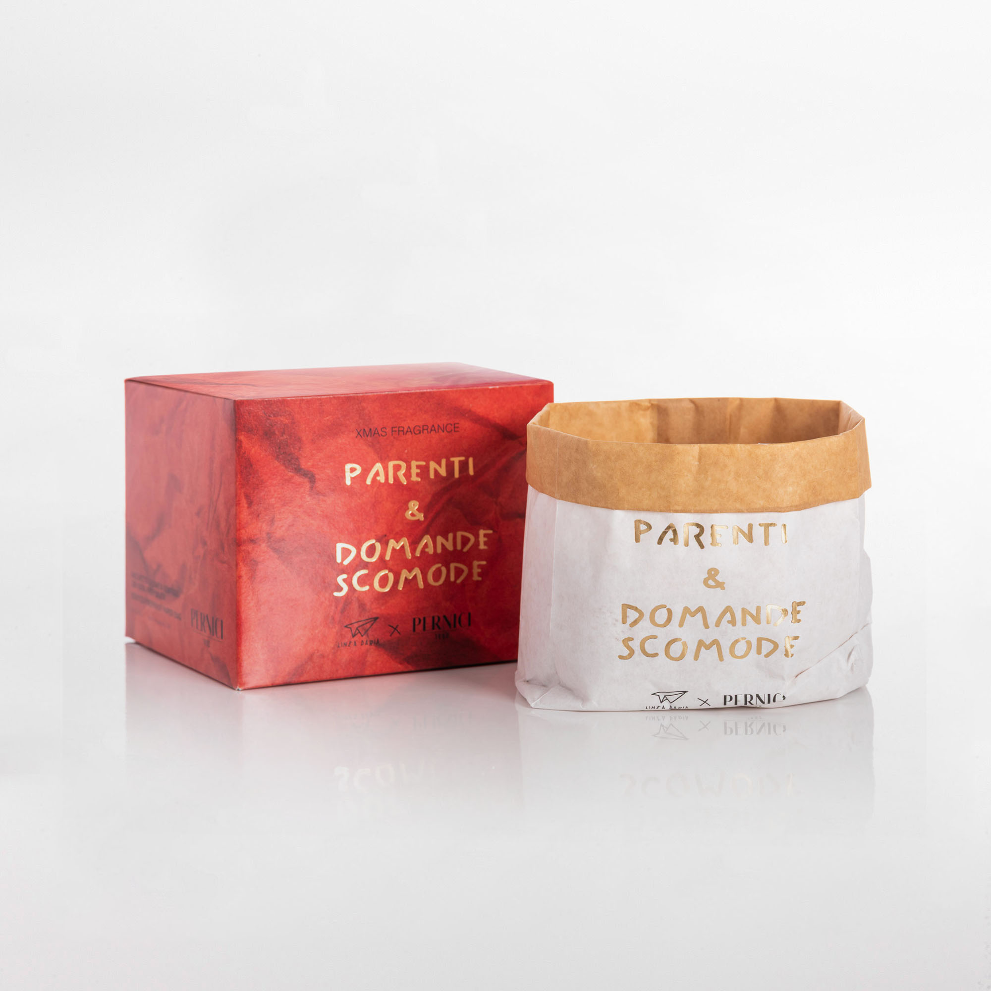 Sacchetto di cera con scritta oro e scatola xmas